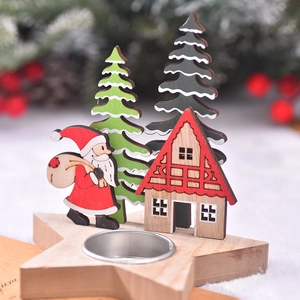 Wooden Christmas candle holder with Santa Claus, miniature trees and a star-shaped base