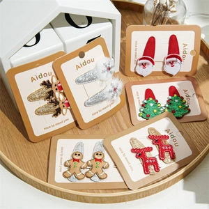 Christmas hair clips set featuring reindeer, sequin trees, and snowflakes for girls