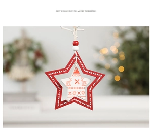 Detail of a red and white wooden star ornament for Christmas tree decoration