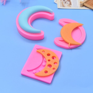 Pink moon shaped silicone molds for baking and DIY clay crafts with moon models
