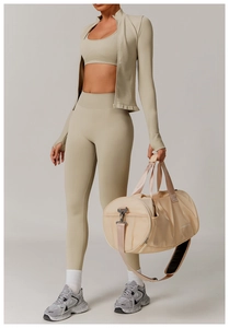 Three-piece beige yoga set featuring a zip-up stand collar jacket and slim-fit leggings