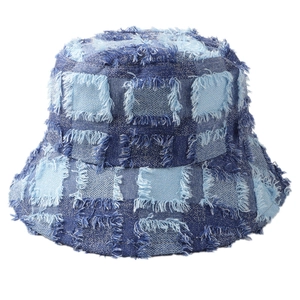 Blue plaid patchwork denim bucket hat with frayed edges for sun protection and style