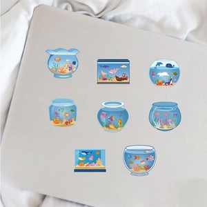 Set of 8 waterproof blue cartoon aquarium stickers applied on a silver laptop lid