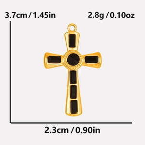 Detailed view of golden cross pendant with black gem and size specifications in inches