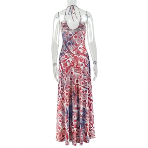 Detail view of the backless halter neckline and boho geometric print on the long maxi dress
