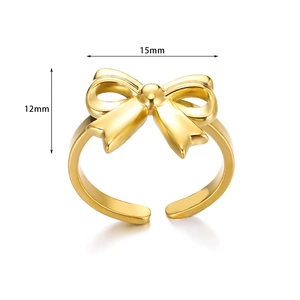 Detailed view of golden bow ring with 15mm width dimensions and adjustable open band