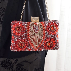 Luxurious red rhinestone evening clutch bag with floral patterns and gold chain strap