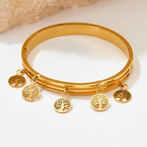 Gold stainless steel bangle with five hollow Tree of Life pendants on a white background