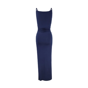 Rear view of a navy blue slim fit maxi dress with elegant pleats and side slit detail
