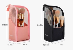 Detailed close-up of mesh travel makeup brush bags with zipper and travel season text