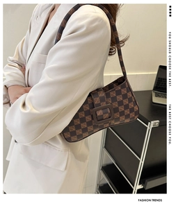 Brown checkered shoulder bag with vintage letter print and large square buckle detail