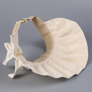 Detailed close-up of sun hat jacquard satin fabric and adjustable metal buckle