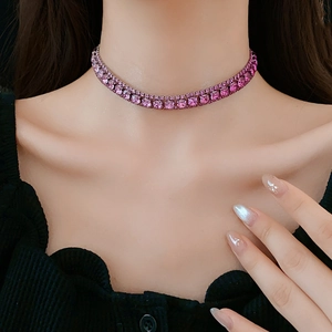 Close-up of elegant pink double-row square rhinestone choker necklace on female model