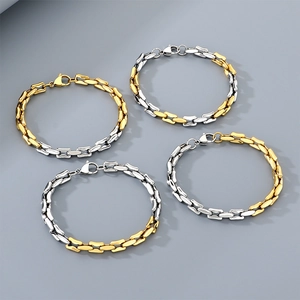 Mixed metal chain bracelet set in gold and silver finish with minimalist bamboo link design