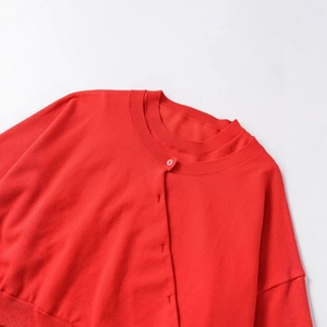 Classic red double-layer knit jacket with round neck and matching buttons on white background