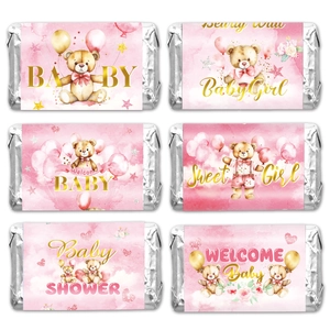 Pink and gold baby shower candy bar wrappers featuring cute teddy bear cartoon designs