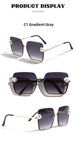 Detail view of square gradient gray sunglasses with pearl accents and gold metal temples