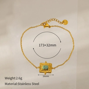 Detail view of gold-plated stainless steel bracelet with turquoise pendant and sizing specs