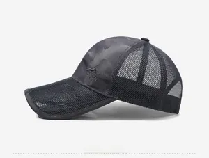 Detail of breathable mesh and embroidered sport mountain logo on camouflage cap