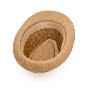 Detail shot of internal sweatband and high-quality woven texture on summer straw hat