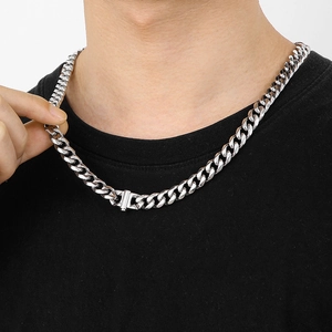 Men's 10mm stainless steel Cuban link necklace shown worn on model for length reference