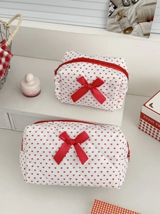 Quilted makeup bag set with red hearts, satin bows, and zip closure in two sizes