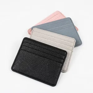 Slim lychee pattern leather card holder available in four stylish colors with 3 slots