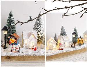Luminous Christmas village set featuring a candy store, snowman and Santa Claus decorations