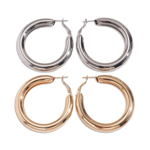 Polished gold and silver thick hollow hoop earrings with a minimalist geometric design
