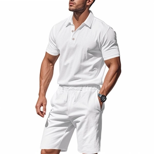 Detail of white linen texture on men's short sleeve polo and drawstring shorts set