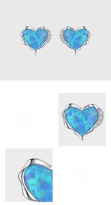 Detail of heart-shaped opal stud earrings crafted in 925 sterling silver pave setting