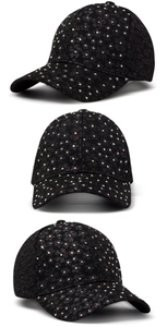 Detail of black lace baseball cap with floral embroidery and colorful rhinestones
