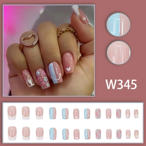 Süße rosa und blaue Kunstnägel mit Blumen Herz und Smiley Nageldesign im Set