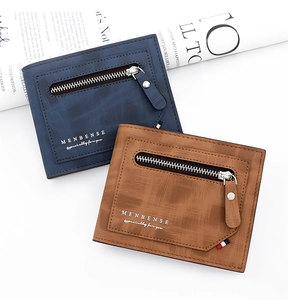 Macro view of textured matte wallet with front zipper pocket and stripe detail