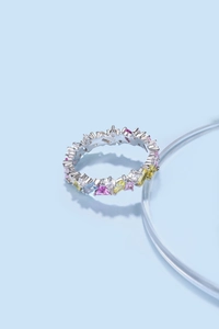 Macro shot of S925 sterling silver ring with multi-colored cubic zirconia and hallmark