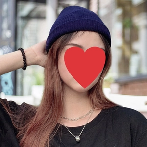 Men's navy blue knitted beanie hat in casual street style for autumn and winter seasons