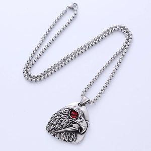 Vintage owl head pendant necklace in stainless steel with striking red stone eyes