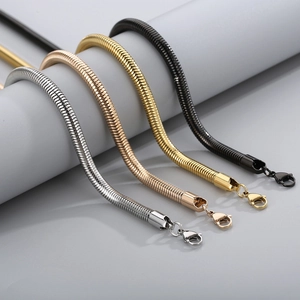 Detailed macro view of smooth snake chains in silver, rose gold, gold, and black colors