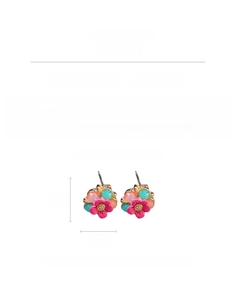 Detail view of flower stud earrings featuring colorful crystals and gold-textured center