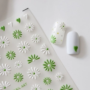 5D embossed floral nail stickers featuring white daisies and green hearts for nail art