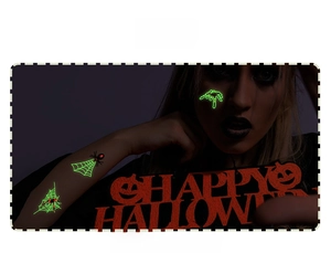 Tatouages d'Halloween toile d'araignée luminescents verts pour décor de fête nocturne