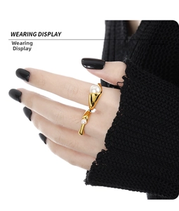 Wearing display of geometric gold S925 silver ring with pearls on model hand