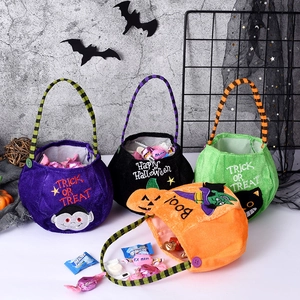 Set of 4 Halloween velvet candy bags featuring pumpkin, witch, vampire, and black cat designs