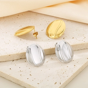 Minimalist oval wave relief stud earrings in gold and silver stainless steel