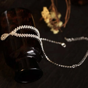 Elegant silver teardrop rhinestone necklace and earrings set for formal evening wear