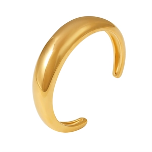 Minimalist 18K gold plated crescent C-shaped open bangle with smooth metallic finish