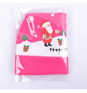 Detail of pink Christmas car headrest cover in OPP packaging with cartoon prints