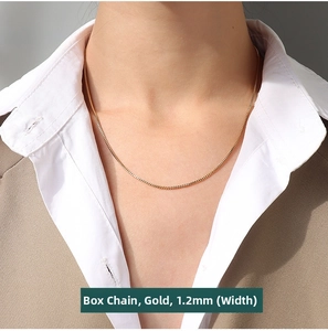 Detail of 1.2mm wide 18K gold plated box chain necklace worn with office attire