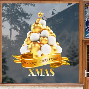 Christmas window sticker with gold balloons as tree and Merry Christmas text on glass