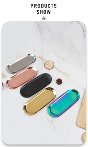 Top view of oval stainless steel trays in silver, rose gold, black, gold, and rainbow colors
